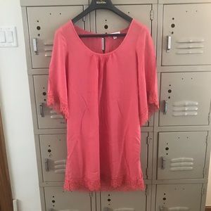 Coral above the knee dress with lace accents